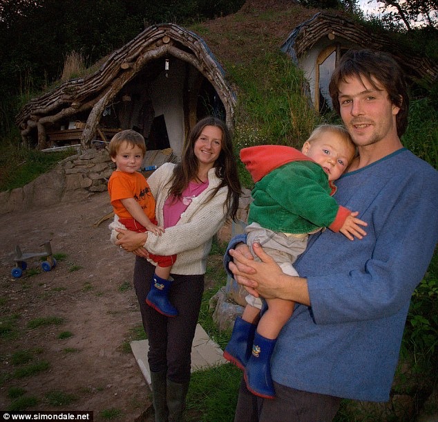 Simon Dale, his wife Jasmine Saville, and their two children.